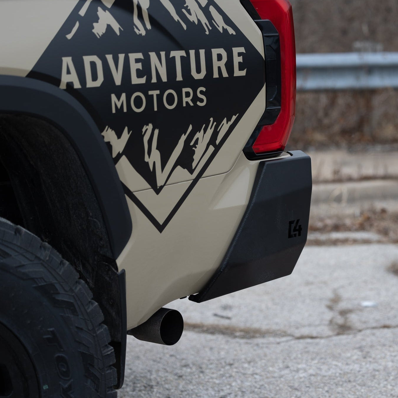 Close up of the side of the C4 Overland bumper for the Toyota Tundra showing how it hugs the body lines of the Tundra's bed.