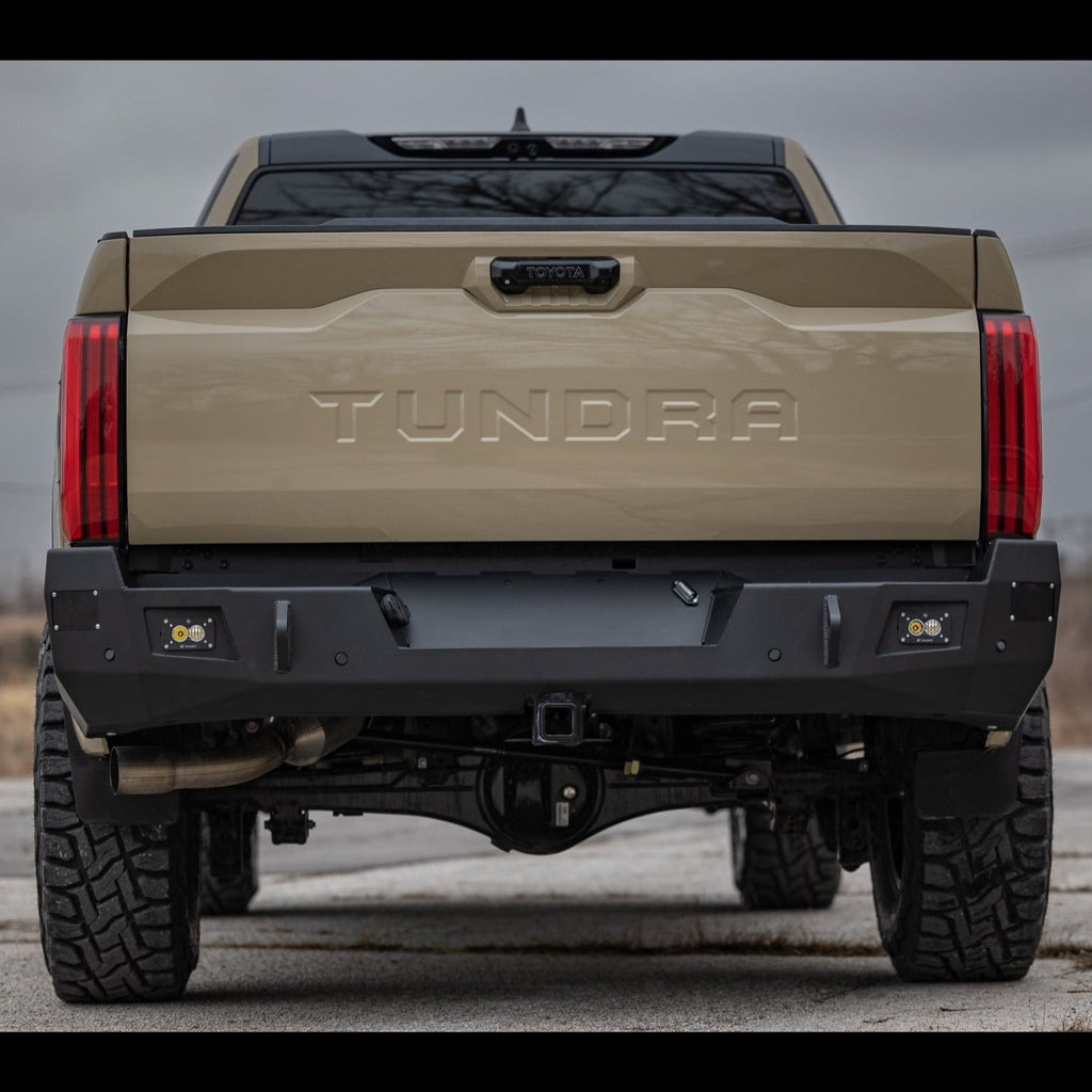 Low angle rear view of the steel C4 Overland bumper for the 2022+ Toyota Tundra.