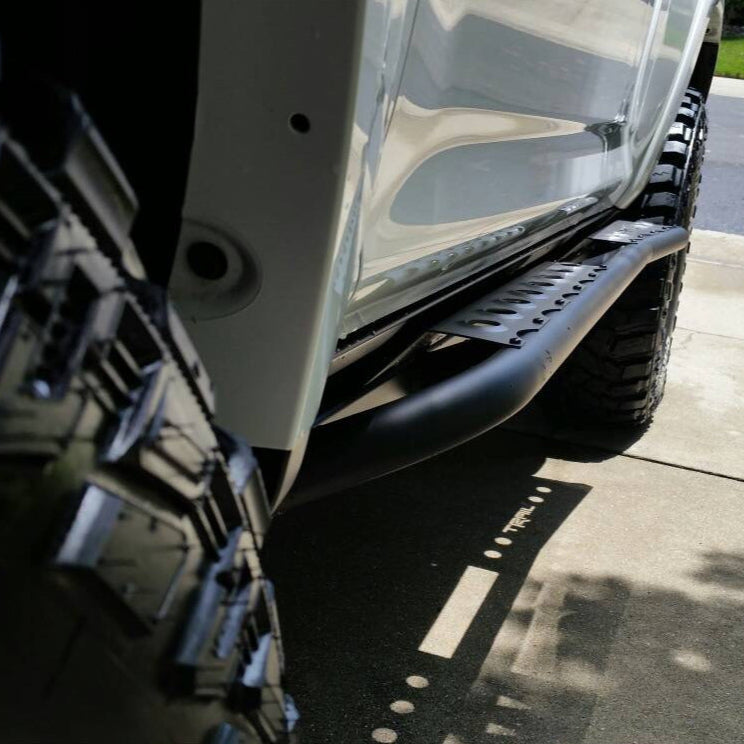 A look down the profile of the C4 Rock Sliders from the front, showing the grippy design of its optional side steps.