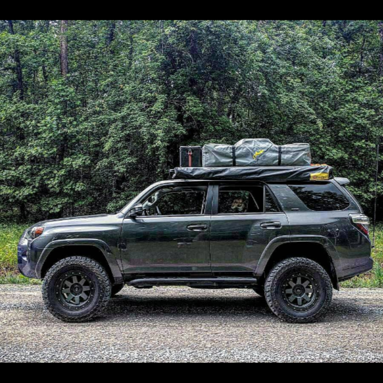 Side view of a well-equipped 5th Generation 4Runner with a set of C4 sliders installed.
