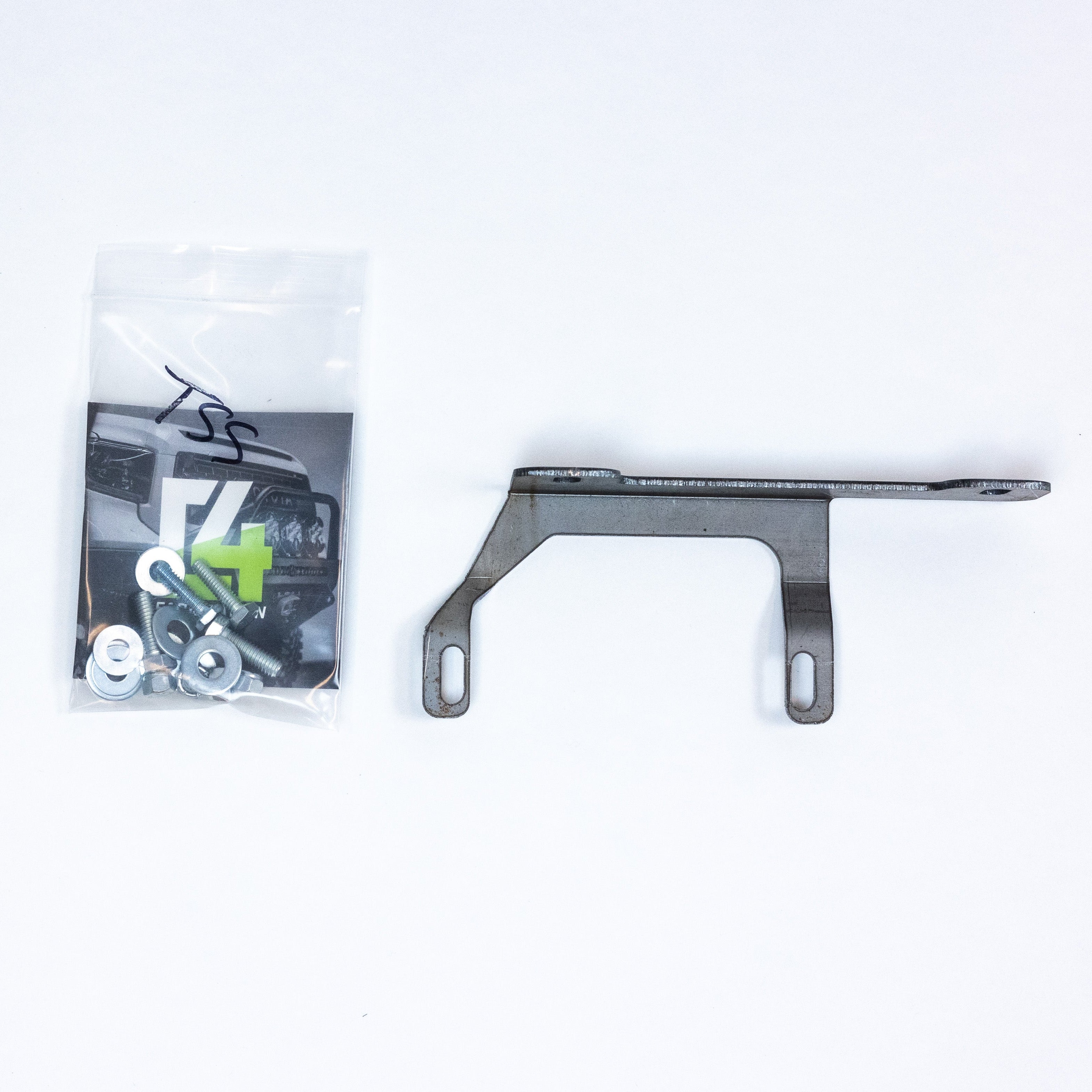 View of the complete TSS Relocation Kit to include the steel bracket and hardware set. 