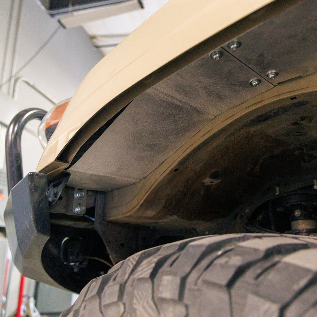 Close-up view looking inside the front of the front wheel well on a 5th Gen 4Runner equipped with C4's Oversized Tire Fitment Kit.