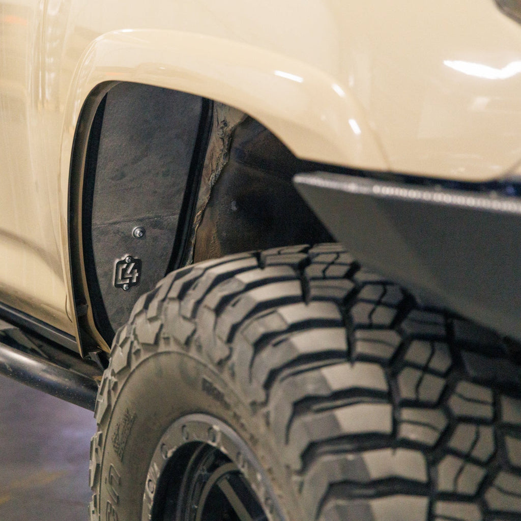 View back into the front wheel well showing the C4 High Clearance Fender Liners included with the complete Oversized Tire Fitment Kit.