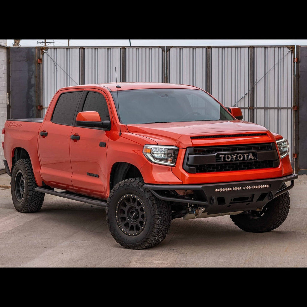 Quartering on photo of a red Tundra CrewMax equipped with the C4 Hybrid bumper. 