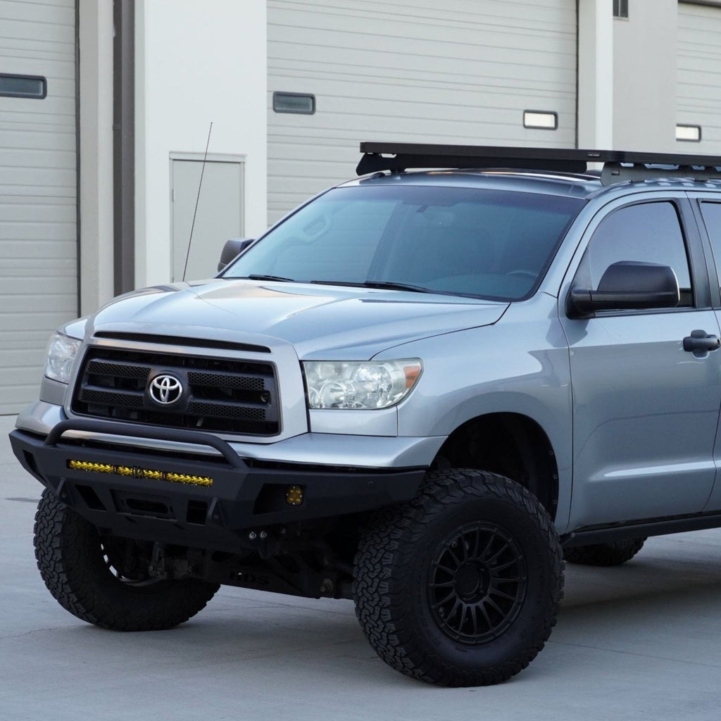 C4 Overland bumper with mid-height bull bar installed on a 2007-2013 Toyota Tundra CrewMax.