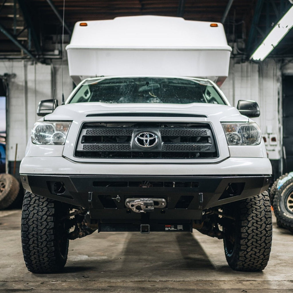 Straight on photo of the Overland front bumper for the 2002-2013 Toyota Tundra manufactured by C4 Fabrication. 