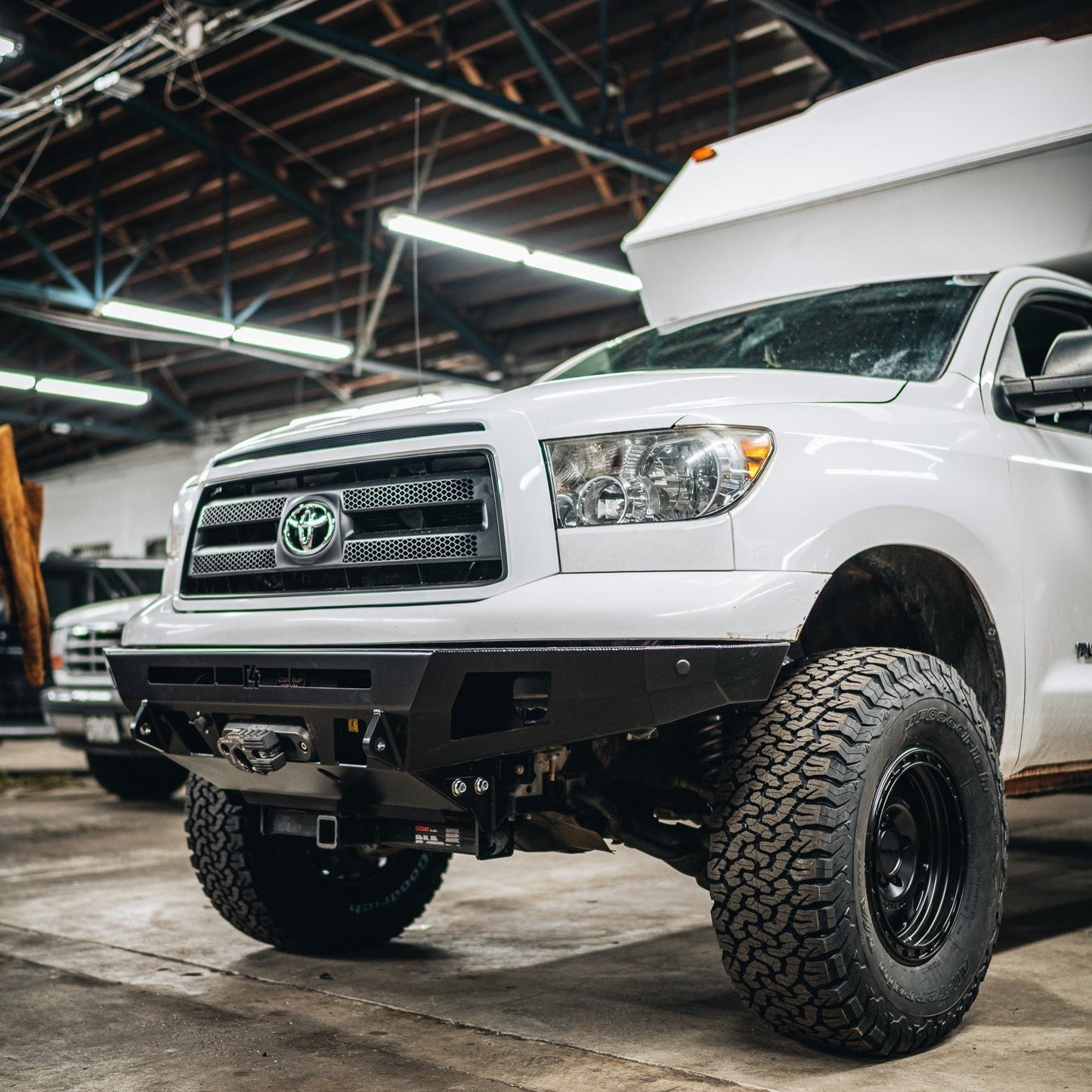 Quartering photo of the C4 Overland front bumper for the 2007-2013 Tundra. 