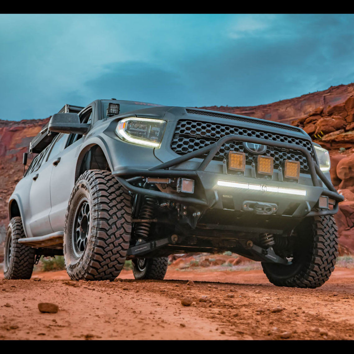 Photo taken from ground level showing the clearance of the 2014+ Toyota Tundra Hybrid bumper from C4 Fabrication. 